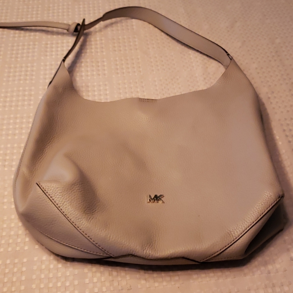 Michael Kors gray leather bag.